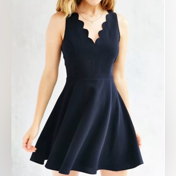 Kimchi Blue Dresses & Skirts - Kimchi Blue black sleeveless romper. Sz S. Dress/shorts. Scalloped straps.
